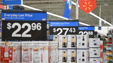 Displays with pricing visible at a Walmart
