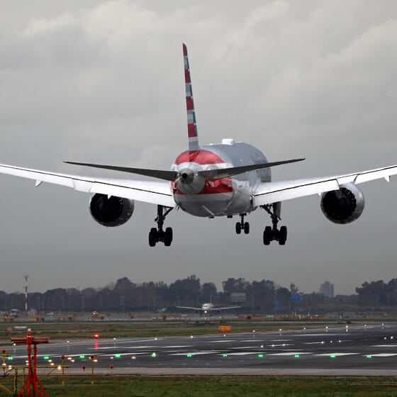 A plane over a runway